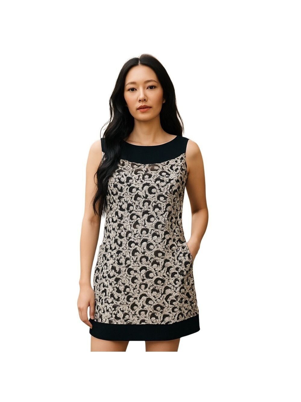 Dress by Cleo. Back/White Sleeveless